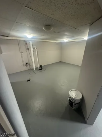 a bathroom with a sink mirror vanity and toilet