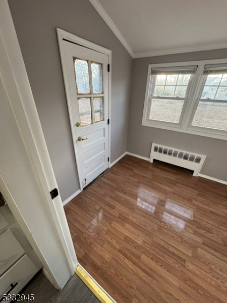 1292 Crescent Avenue Roselle, NJ 07203 - Photo 4 of 35 an empty room with wooden floor and windows