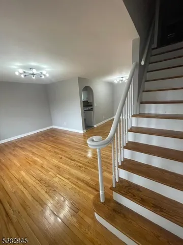a view of entryway with wooden floor
