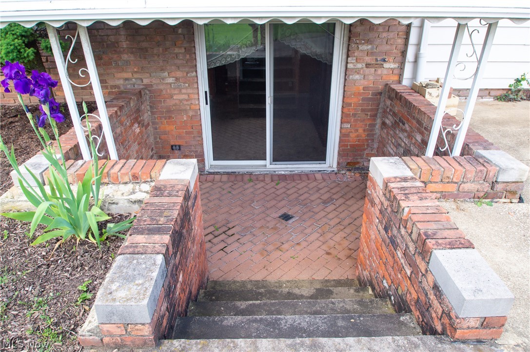 5650 Falkirk Road Lyndhurst, OH 44124 - Photo 24 of 28 Adorable covered Brick Patio- perfect for grilling!