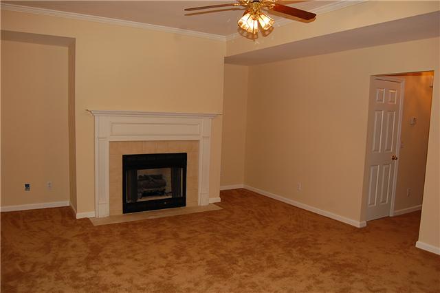 2106 Roderick Place West Franklin, TN 37064 - Photo 3 of 14 This cozy family room has a wonderful fireplace. Enjoy your family and friends while warming up near the fire!