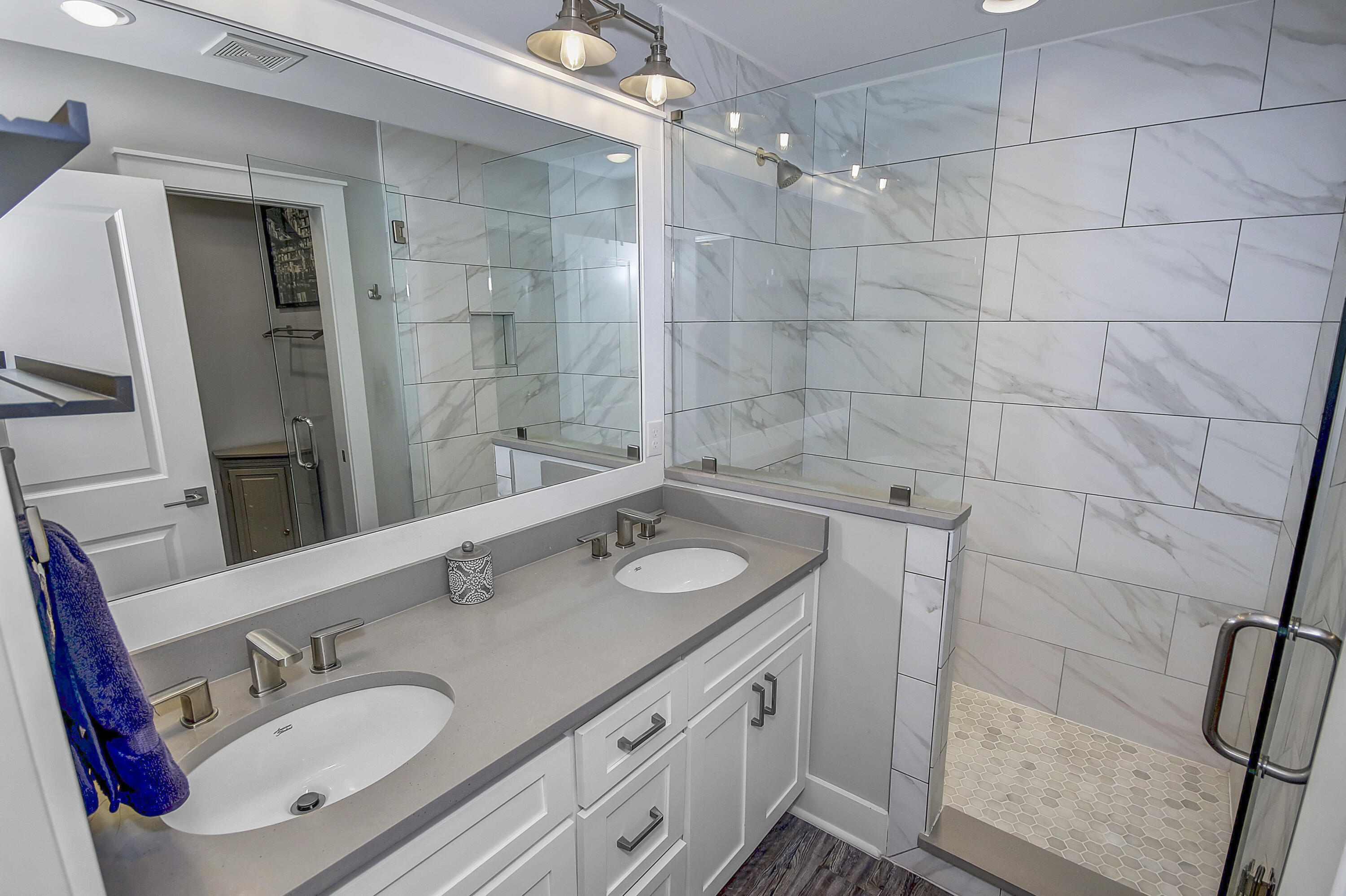 59 Walton Gulfview Drive Inlet Beach, FL 32461 - Photo 12 of 26 a bathroom with a sink vanity granite and shower