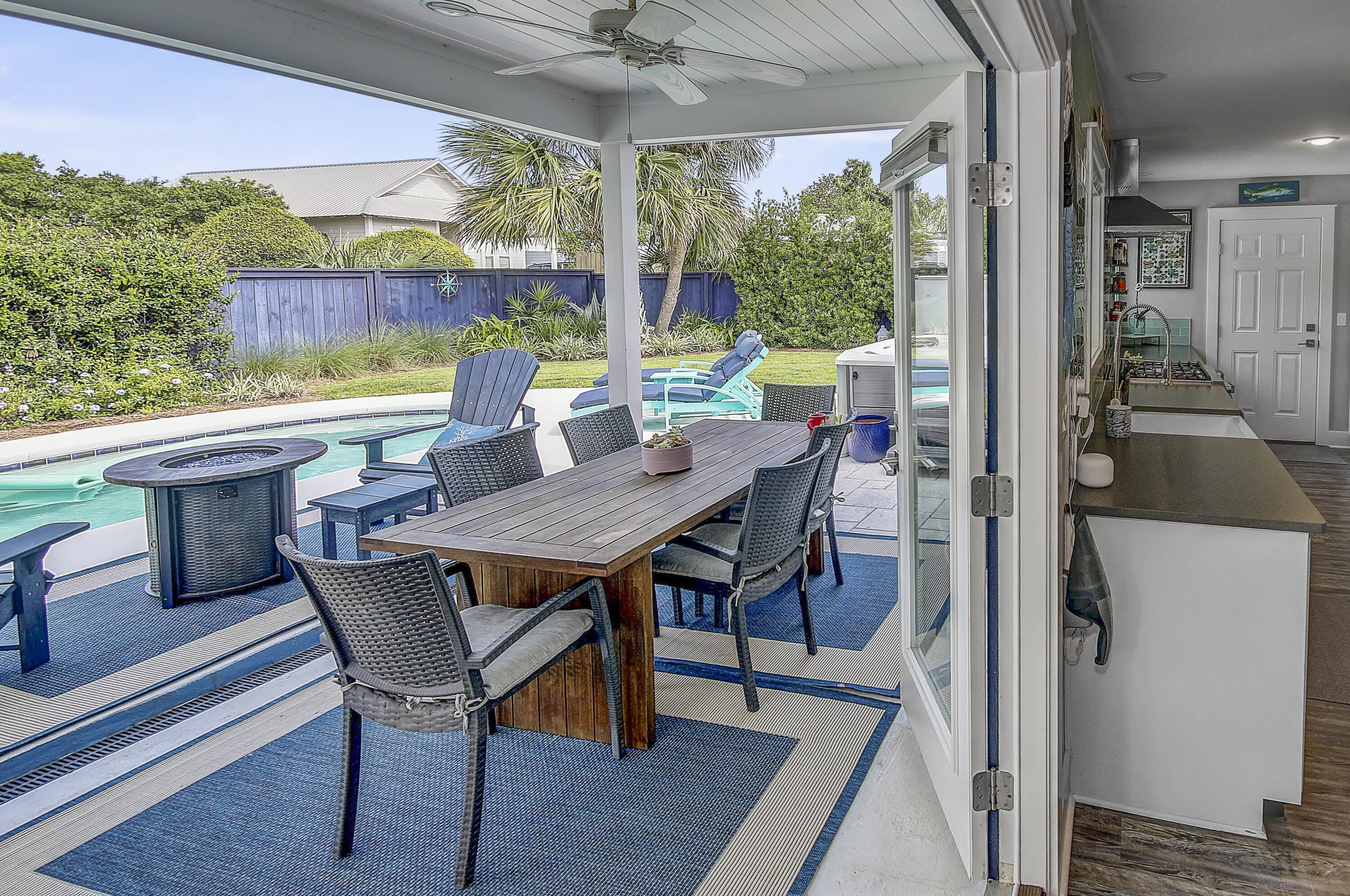 59 Walton Gulfview Drive Inlet Beach, FL 32461 - Photo 17 of 26 a view of a dining table and chairs in the balcony
