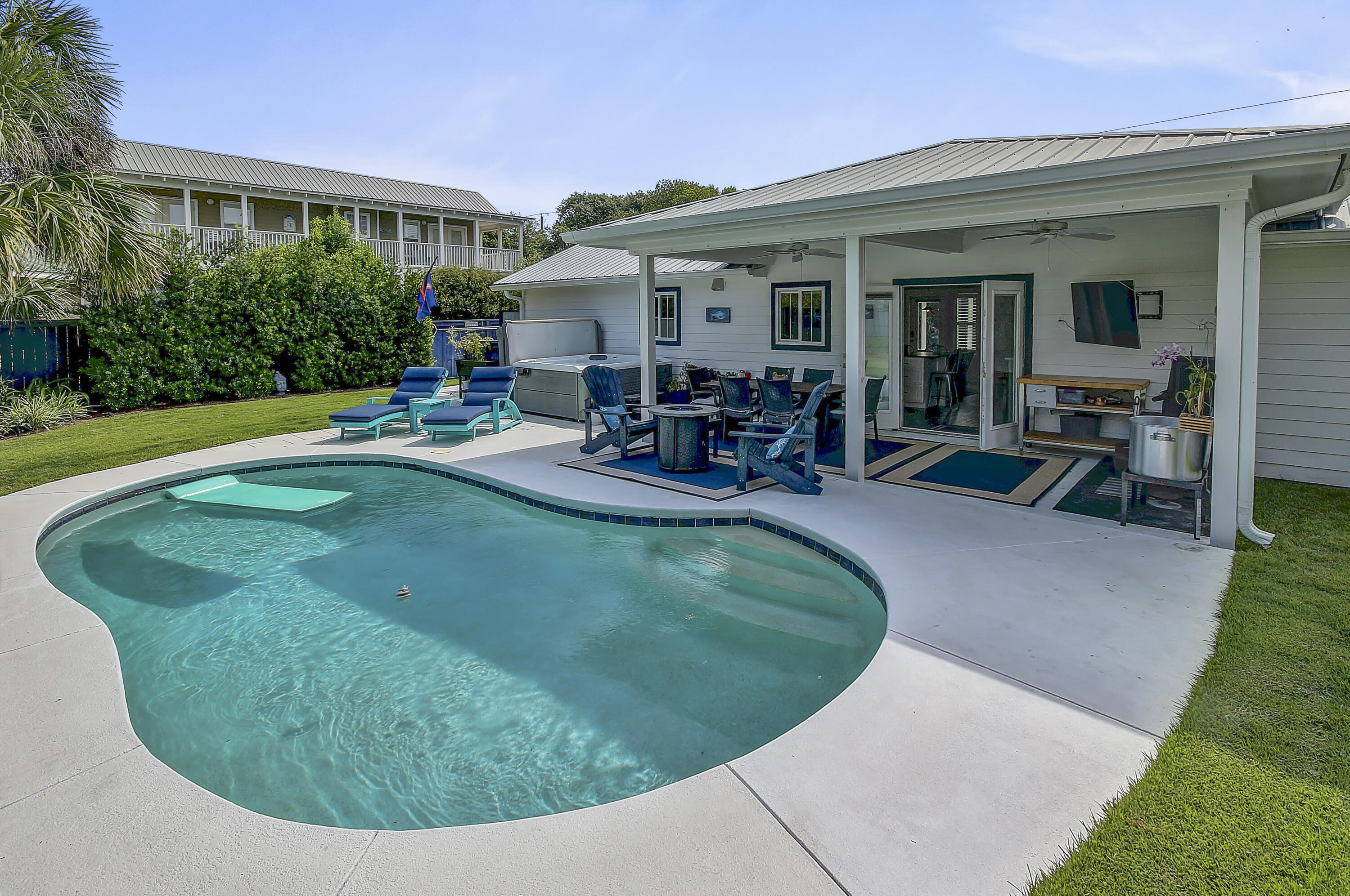 59 Walton Gulfview Drive Inlet Beach, FL 32461 - Photo 20 of 26 a view of a house with swimming pool and porch