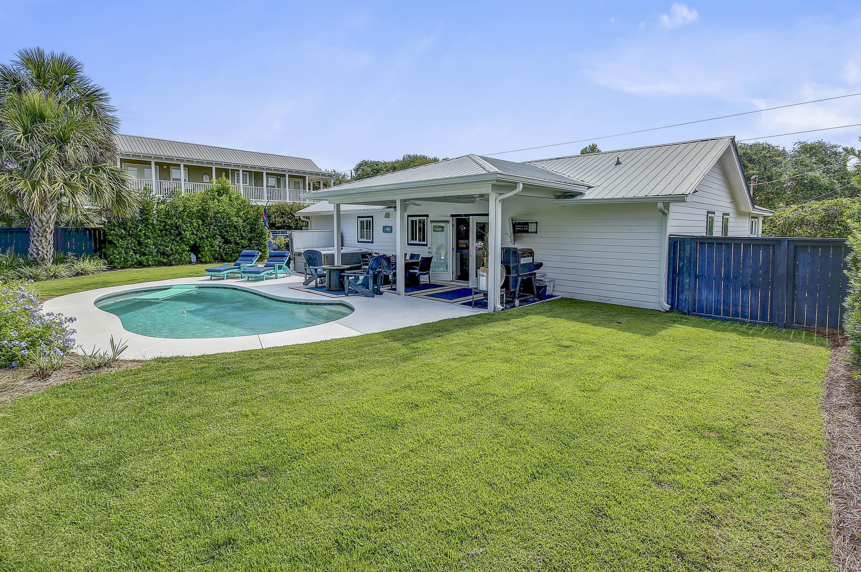 59 Walton Gulfview Drive Inlet Beach, FL 32461 - Photo 22 of 26 a view of a house with a yard and sitting area
