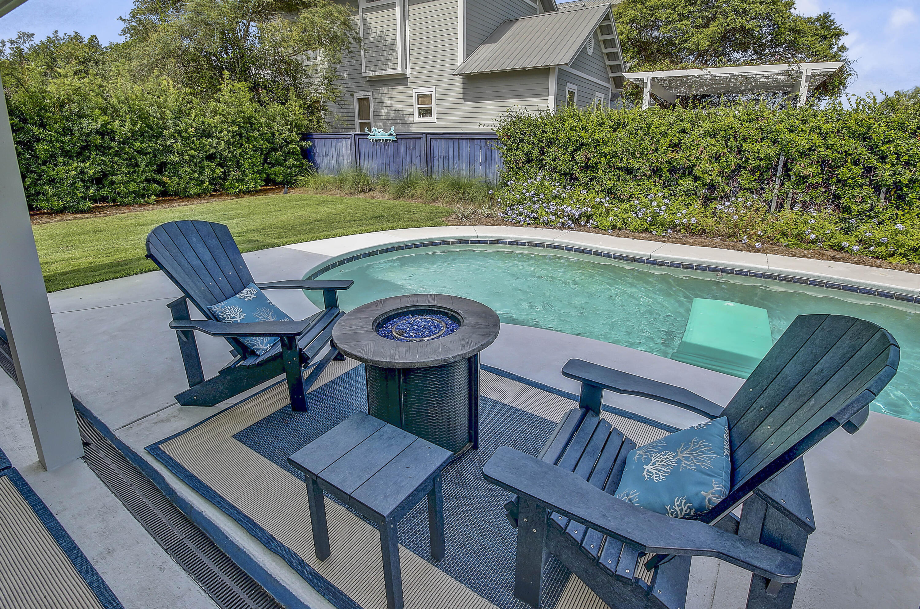 59 Walton Gulfview Drive Inlet Beach, FL 32461 - Photo 23 of 26 a view of a chairs and table in the patio