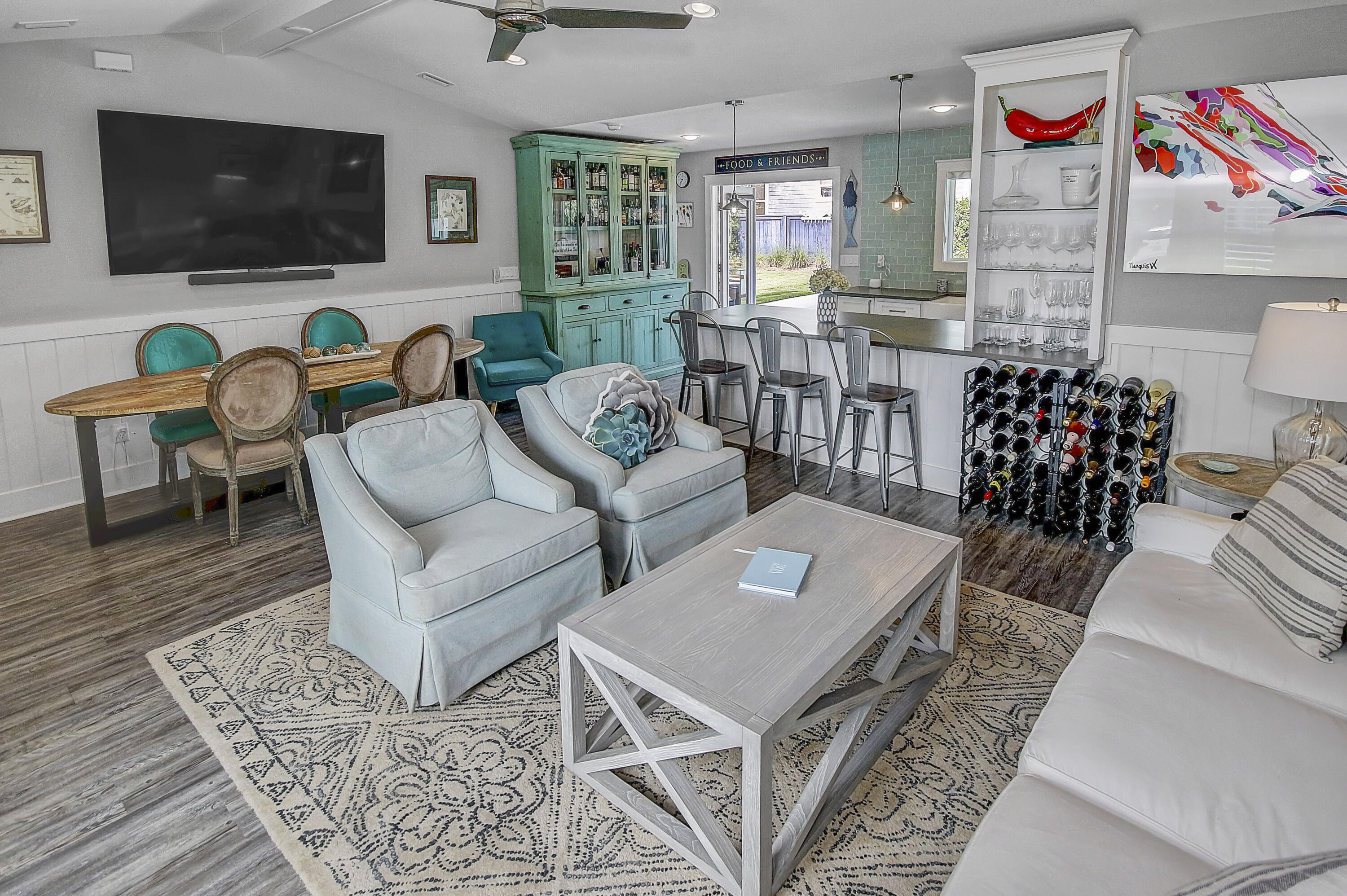 59 Walton Gulfview Drive Inlet Beach, FL 32461 - Photo 6 of 26 a living room with furniture and a flat screen tv