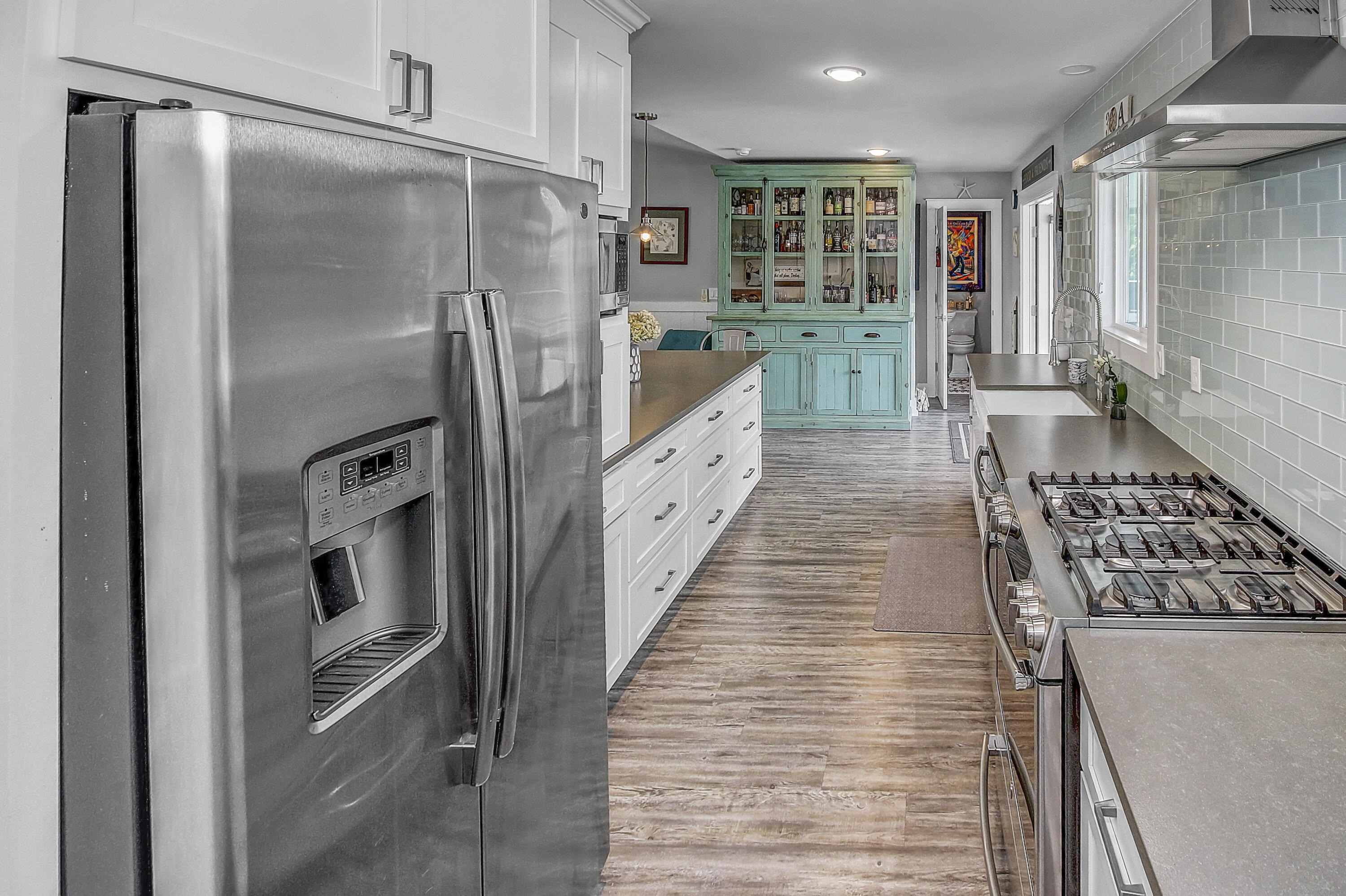 59 Walton Gulfview Drive Inlet Beach, FL 32461 - Photo 10 of 26 a kitchen with stainless steel appliances granite countertop a refrigerator and a stove