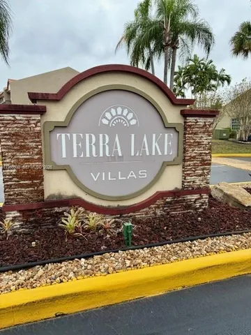 a front view of a house with swimming pool