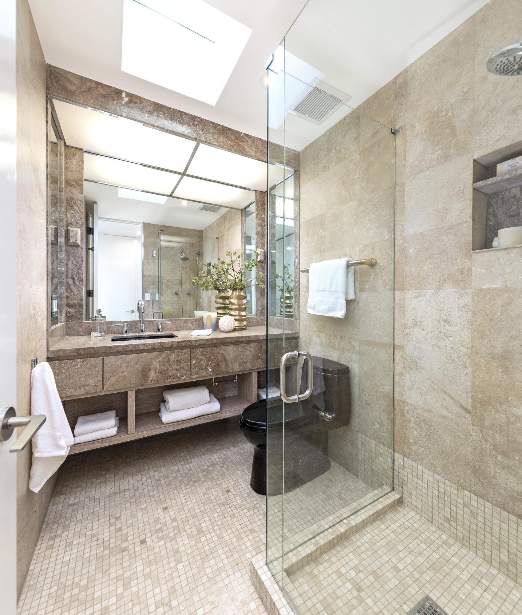 1524 East Valley Road Montecito, CA 93108 - Photo 11 of 19 a bathroom with a mirror and a sink