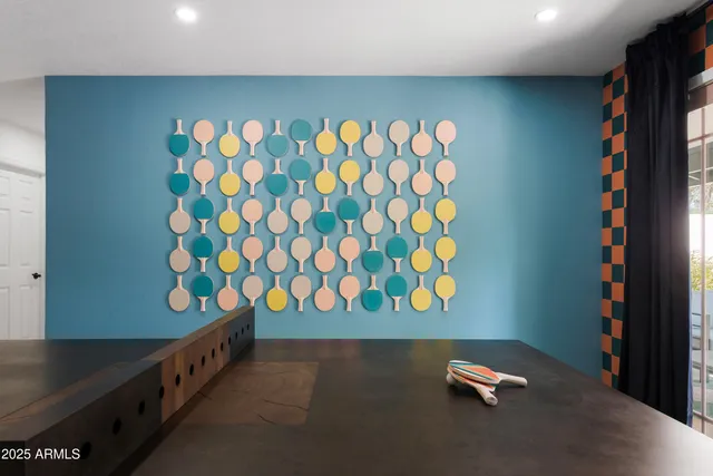 a bathroom with a granite countertop sink a toilet and shower