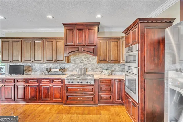 a bath tub sitting in a bathroom next to a window