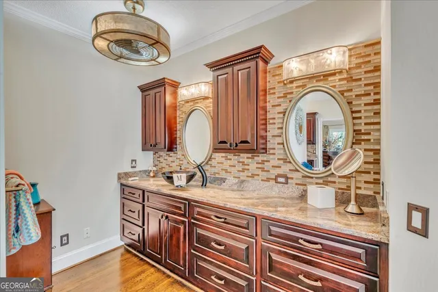 a view of a chair and table on the deck