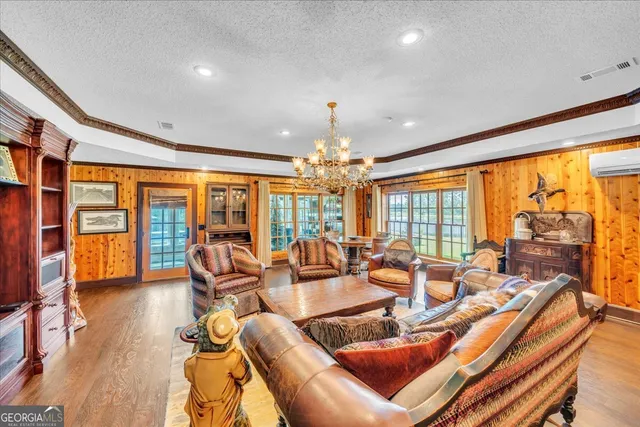 a view of a lake with houses in the background