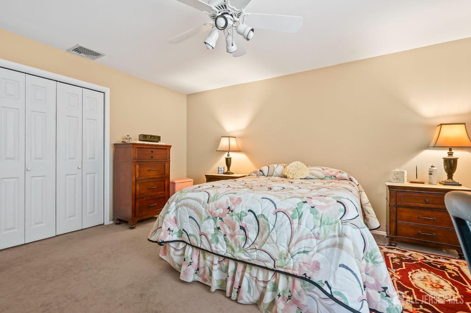 41 Rodak Circle Edison, NJ 08817 - Photo 22 of 28 a bedroom with a bed and wooden floor