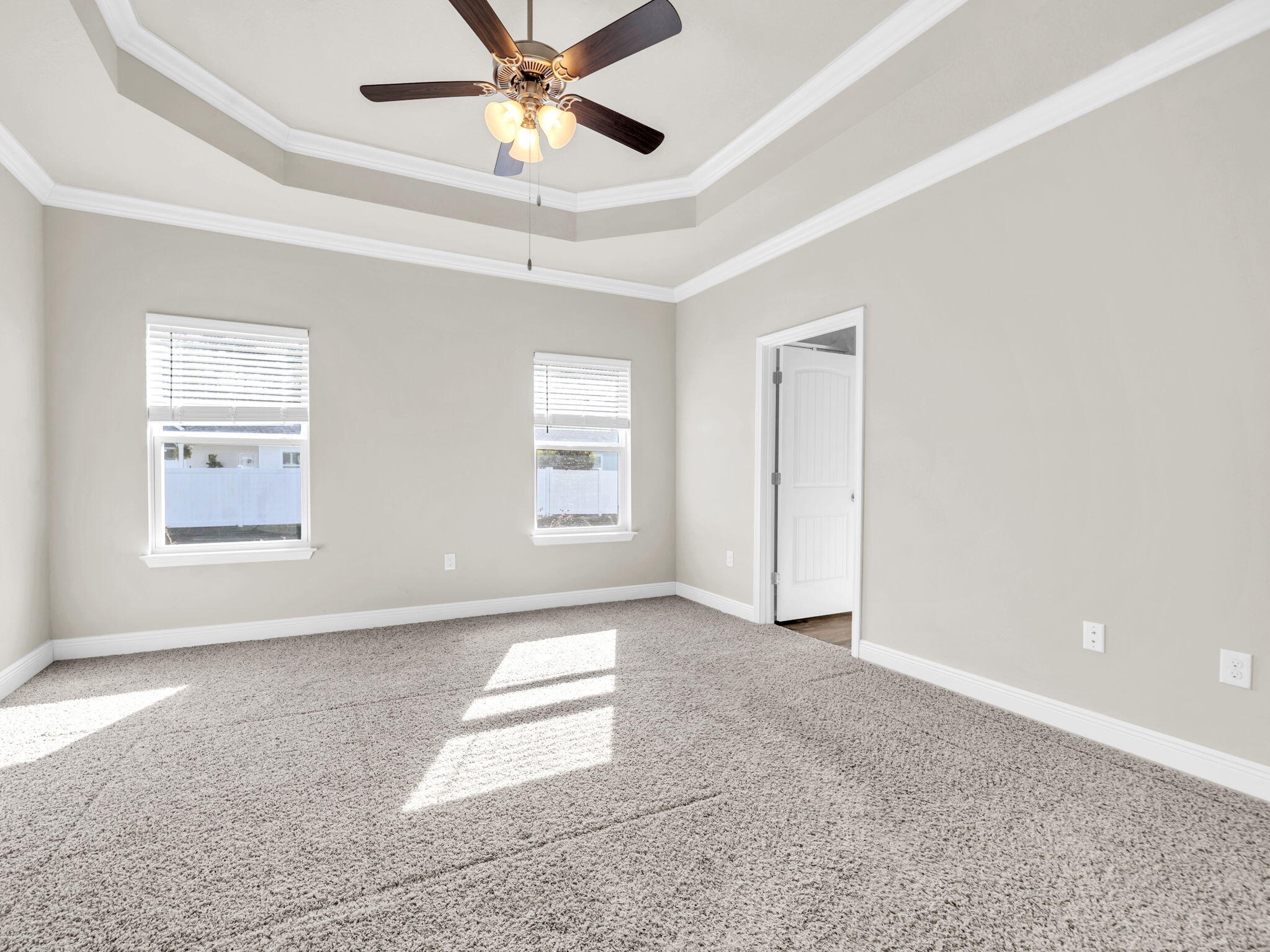 218 Stonegate Drive Santa Rosa Beach, FL 32459 - Photo 21 of 37 an empty room with windows and fan
