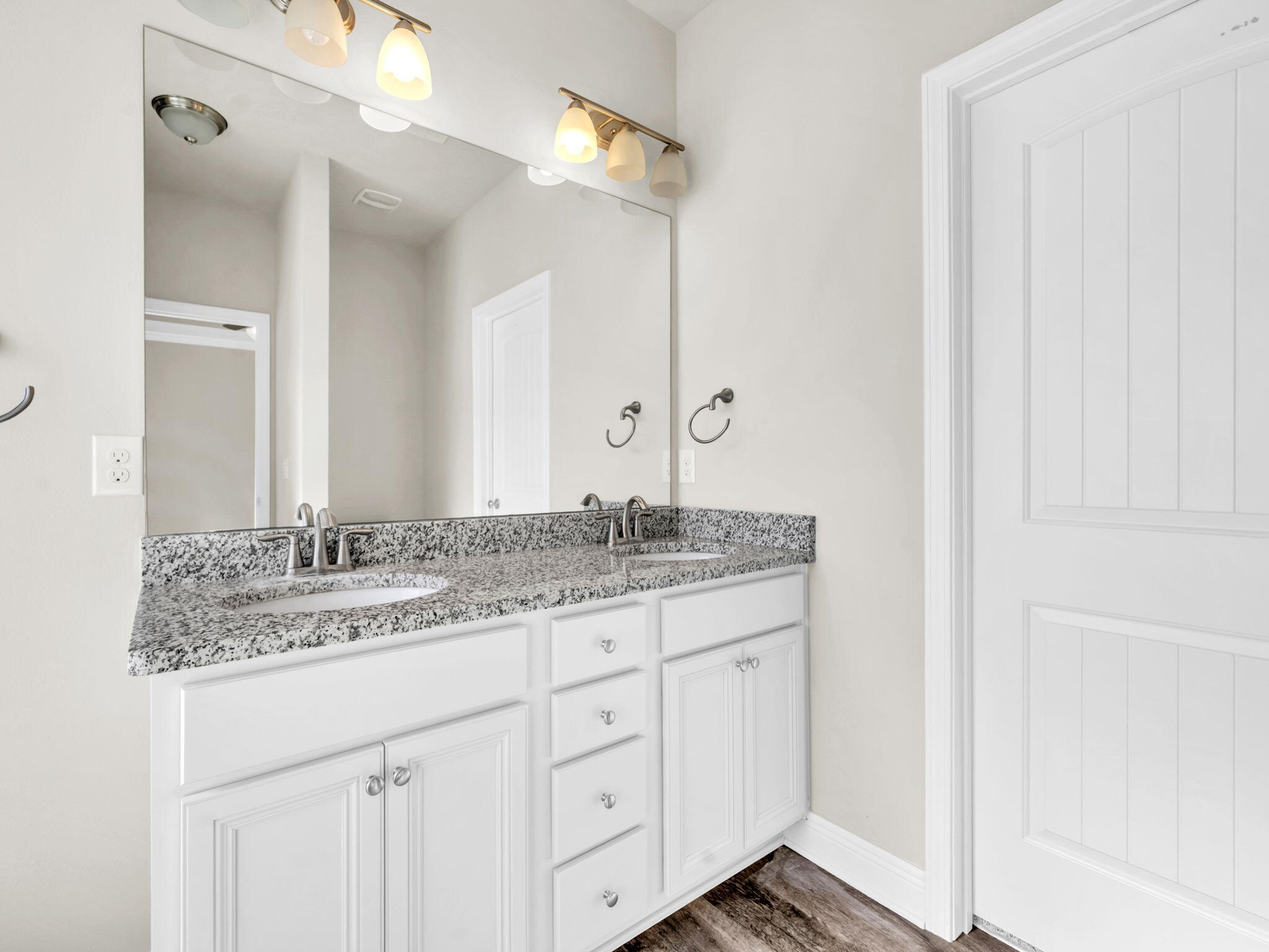 218 Stonegate Drive Santa Rosa Beach, FL 32459 - Photo 23 of 37 a bathroom with a granite countertop sink and a mirror