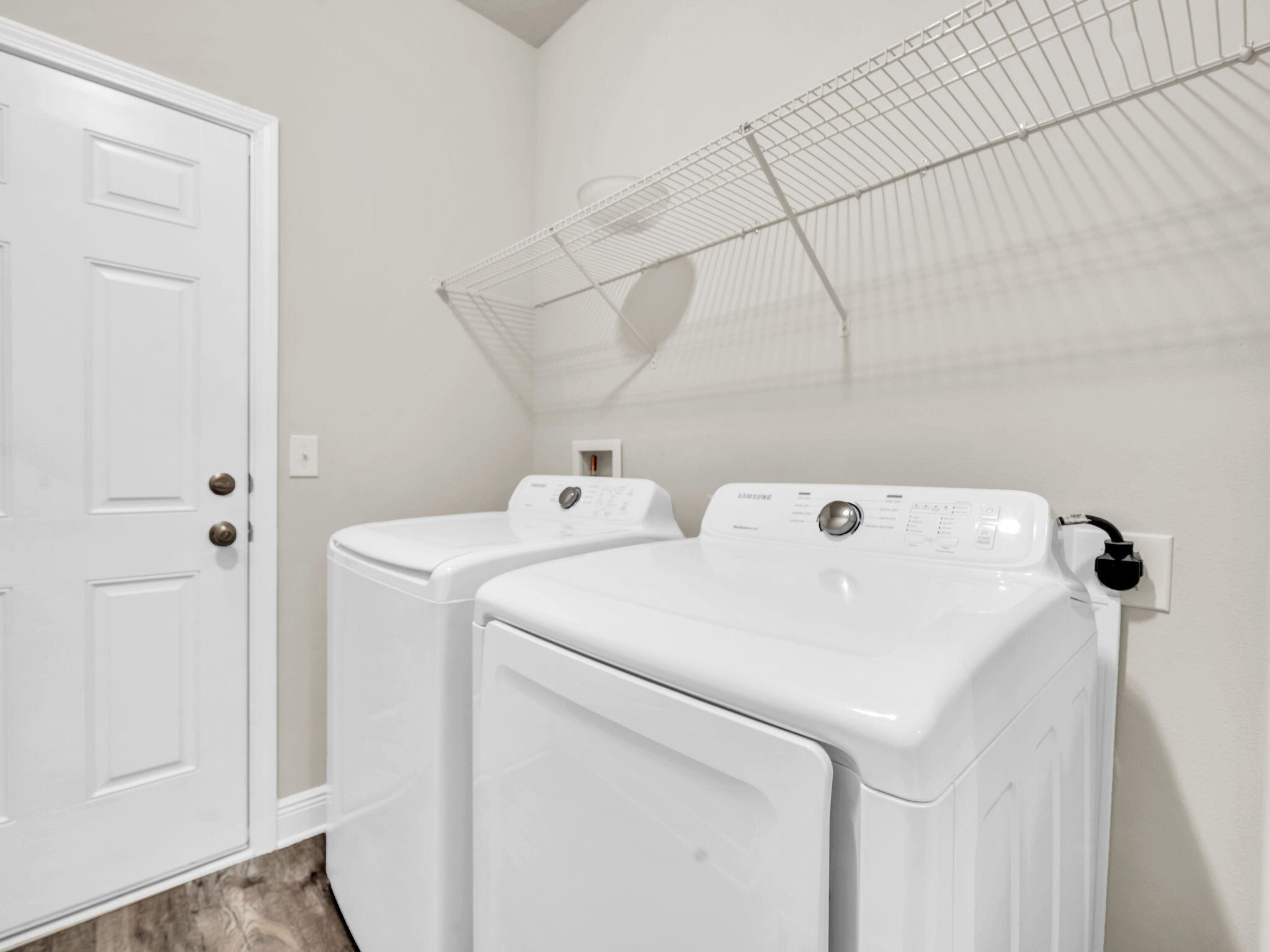 218 Stonegate Drive Santa Rosa Beach, FL 32459 - Photo 30 of 37 a utility room with dryer and washer