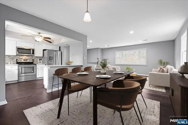 a view of a dining room with furniture