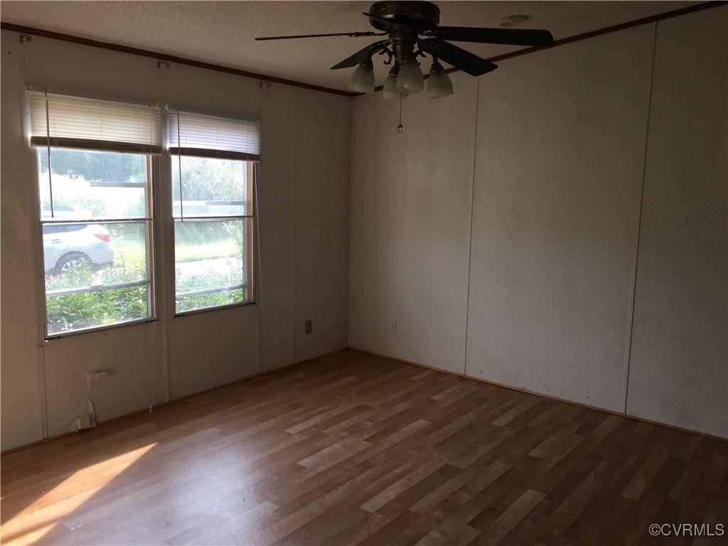 12232 Darbys Road Doswell, VA 23047 - Photo 14 of 20 an empty room with a window