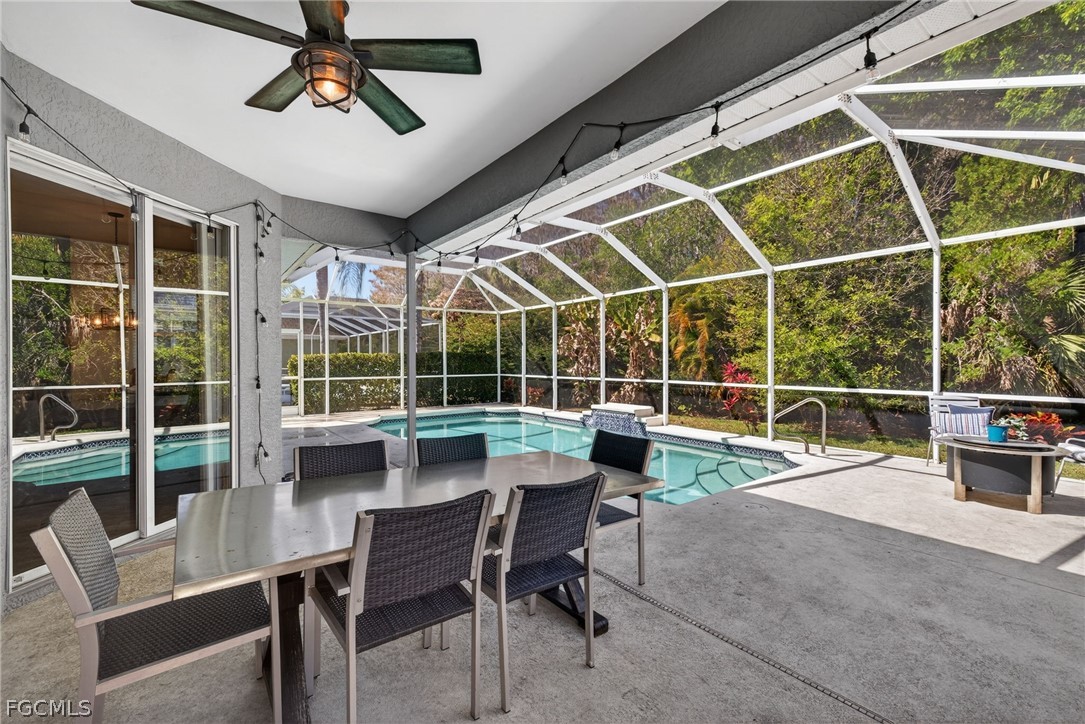 22866 Forest Ridge Drive Estero, FL 33928 - Photo 29 of 38 a view of a dining room with furniture window and outside view
