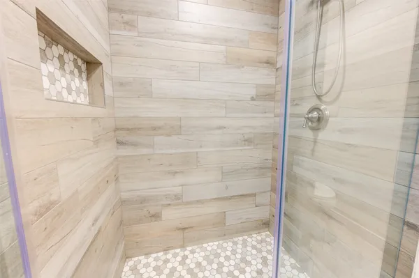 a view of small space with racks on the wall