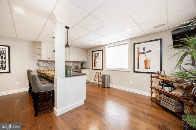 a room with furniture and a flat screen tv