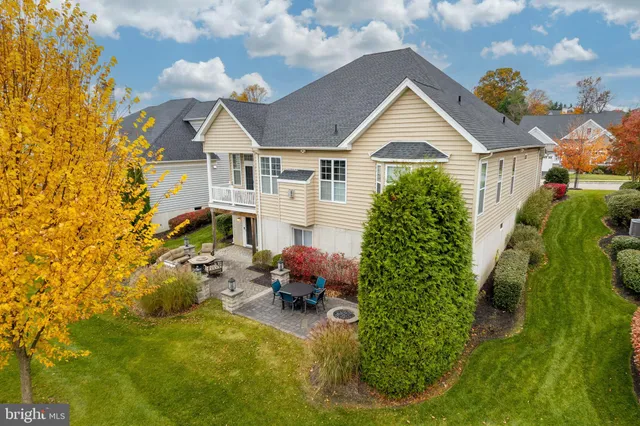 a front view of house with yard outdoor seating and entertaining space
