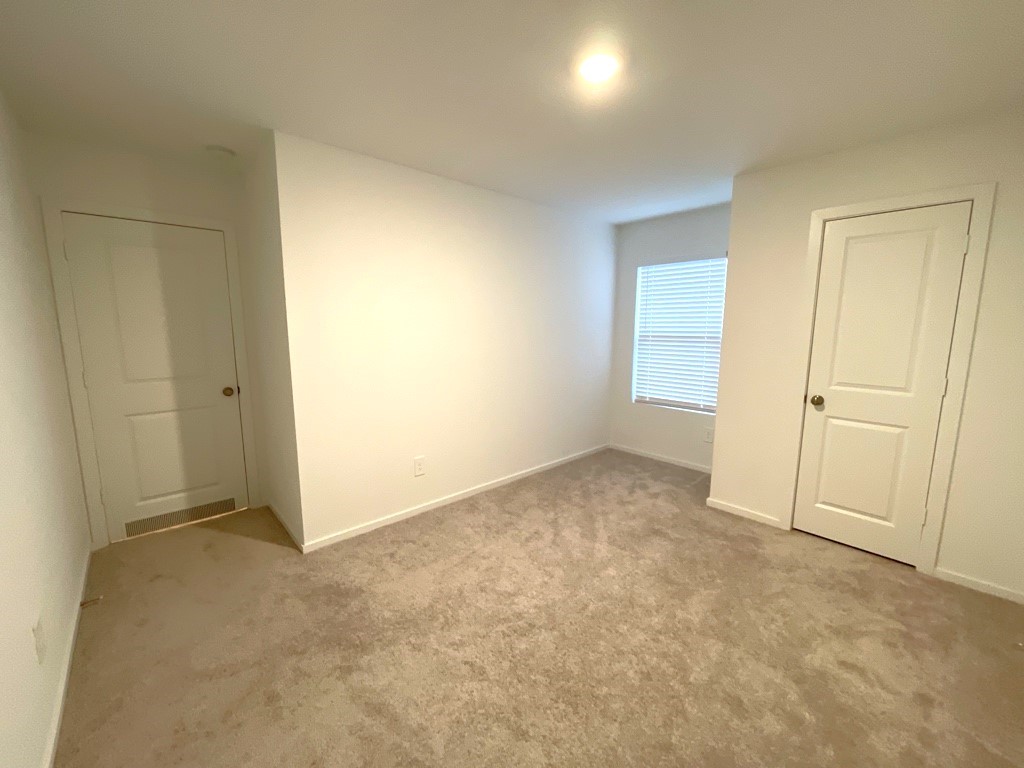 1612 Colina Creek Conroe, TX 77301 - Photo 12 of 33 an empty room with closet area