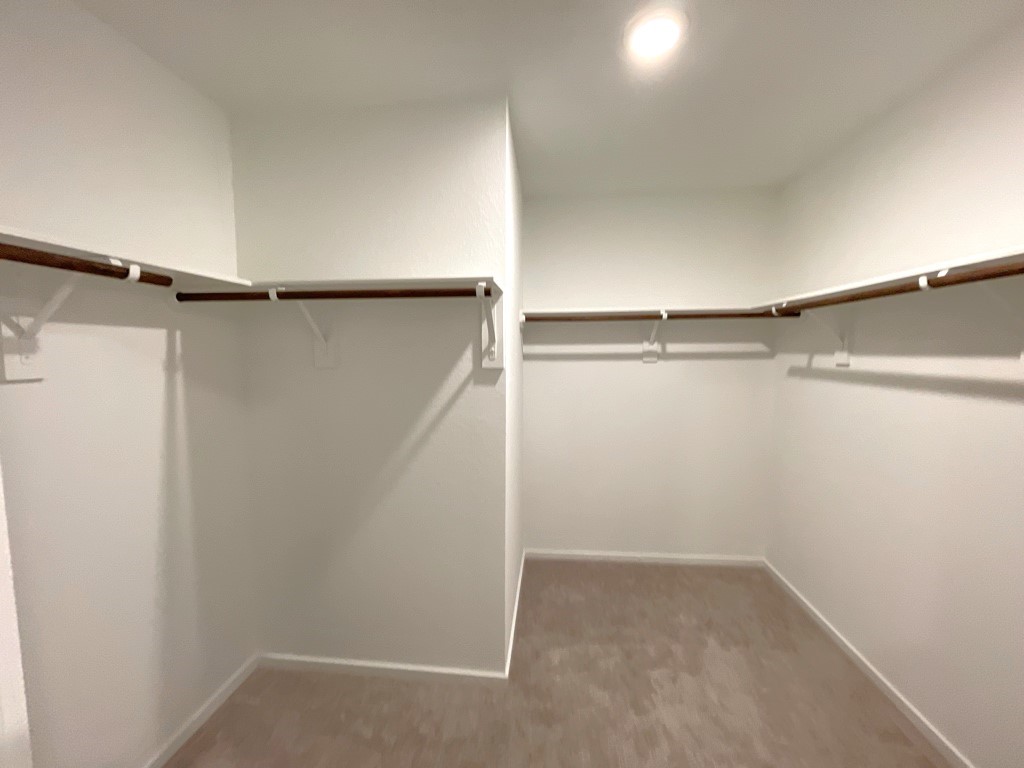 1612 Colina Creek Conroe, TX 77301 - Photo 22 of 33 a view of an empty walk in closet
