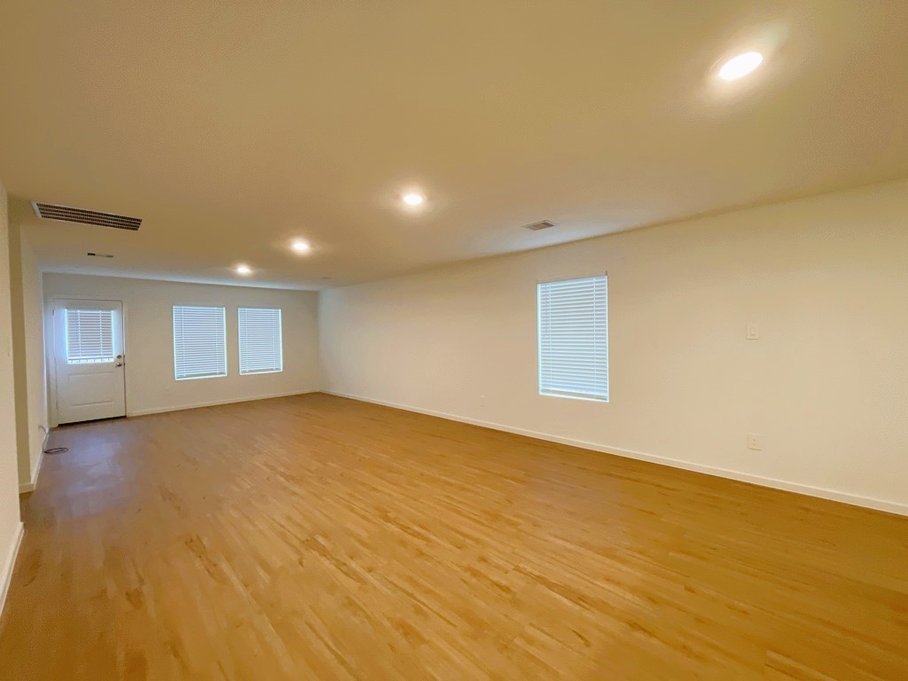 1612 Colina Creek Conroe, TX 77301 - Photo 5 of 33 an empty room with a empty space and window