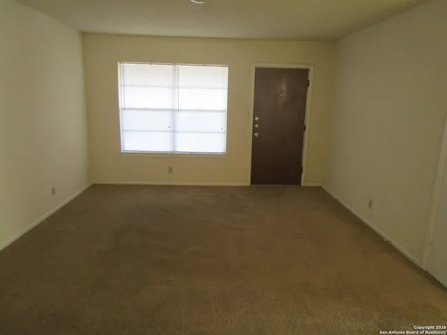 an empty room with a window