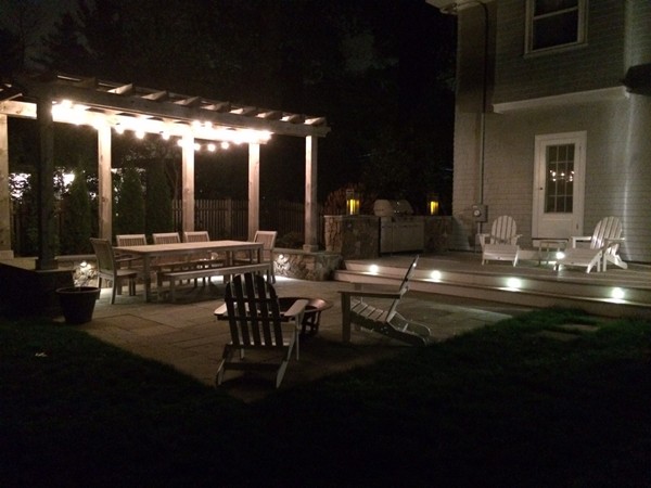 25 Woodside Road Newton, MA 02460 - Photo 13 of 13 a outdoor dining area with chairs and a table