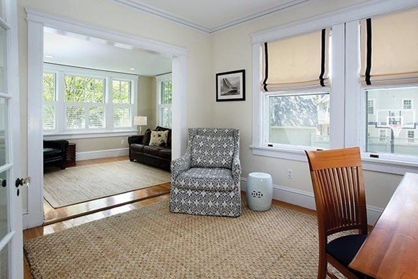 25 Woodside Road Newton, MA 02460 - Photo 10 of 13 a living room with furniture and a window