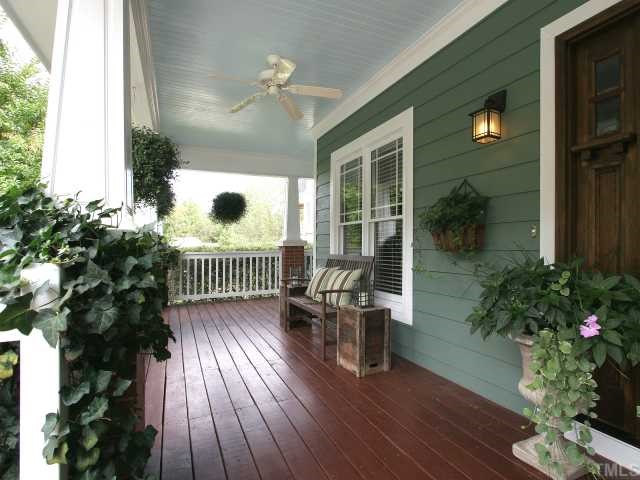 705 Scotts Ridge Trail Apex, NC 27502 - Photo 2 of 12 This large covered front porch is the perfect place to relax and enjoy the temperate North Carolina weather.