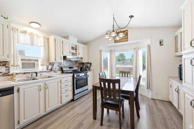 1525 South 400 East, Unit 13 Springville, UT 84663 - Photo 12 of 32 Kitchen featuring light-toned cabinetry, stainless steel appliances, and wood-finish flooring