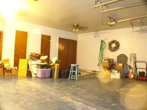 a view of a dining room with many windows