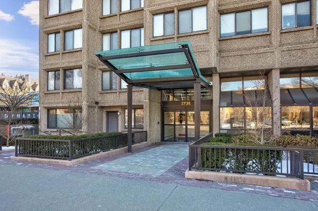 a front view of a building with windows