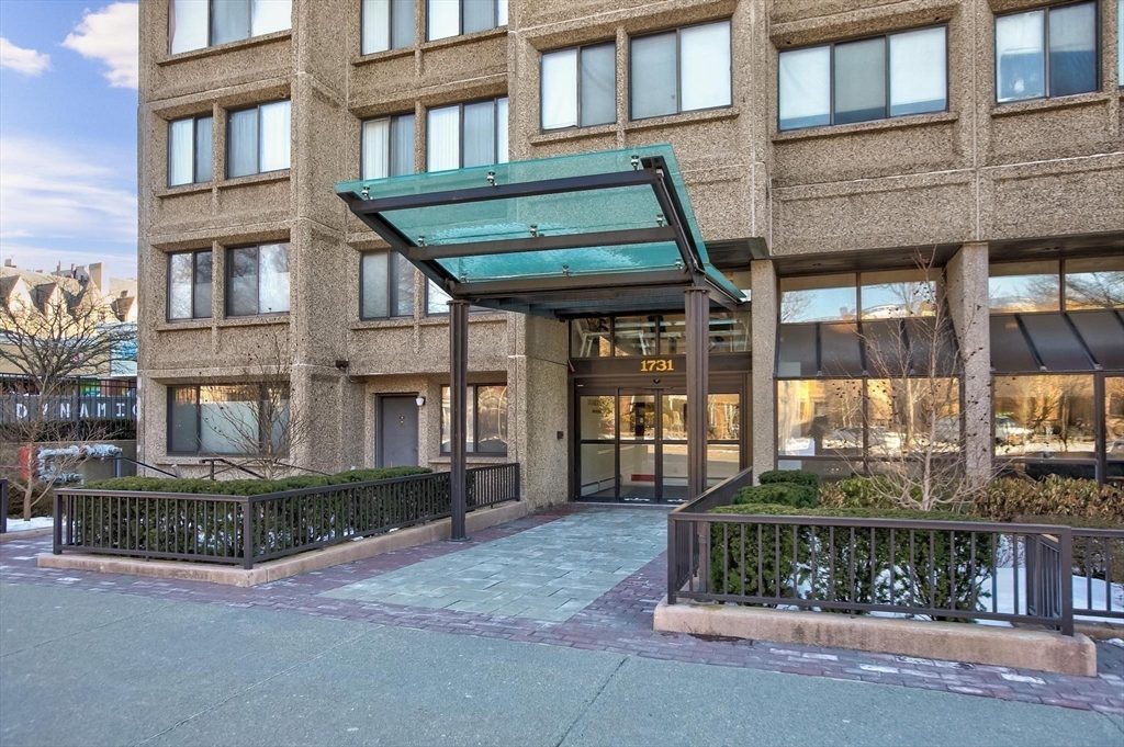 a front view of a building with windows