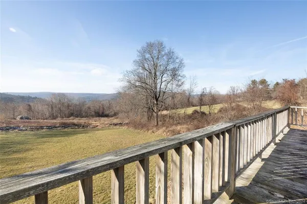 a view of mountain with lake view
