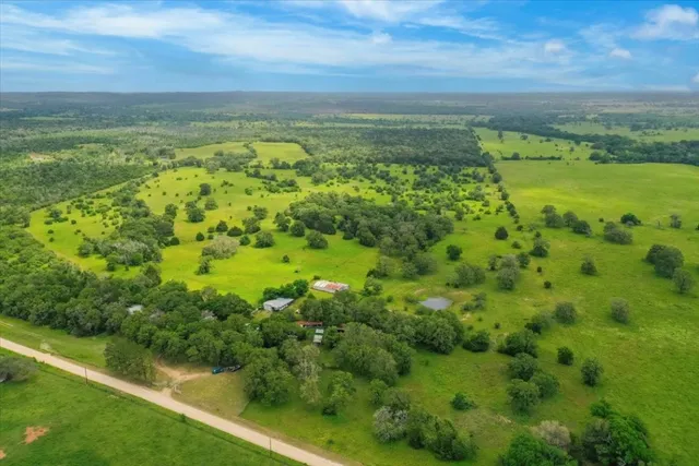 a view of a garden with an ocean