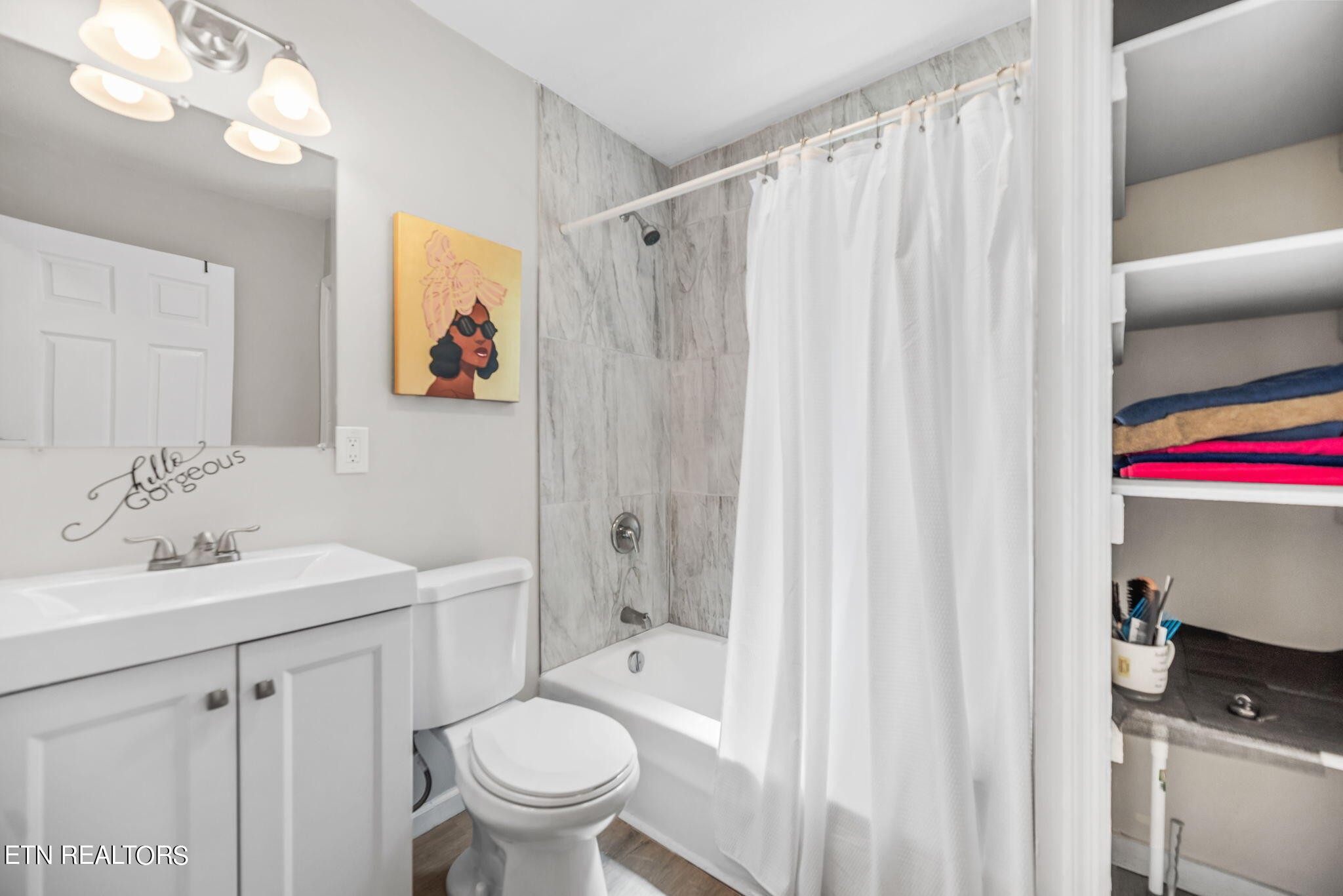104 Tucker Road Oak Ridge, TN 37830 - Photo 12 of 28 a bathroom with a sink toilet and shower