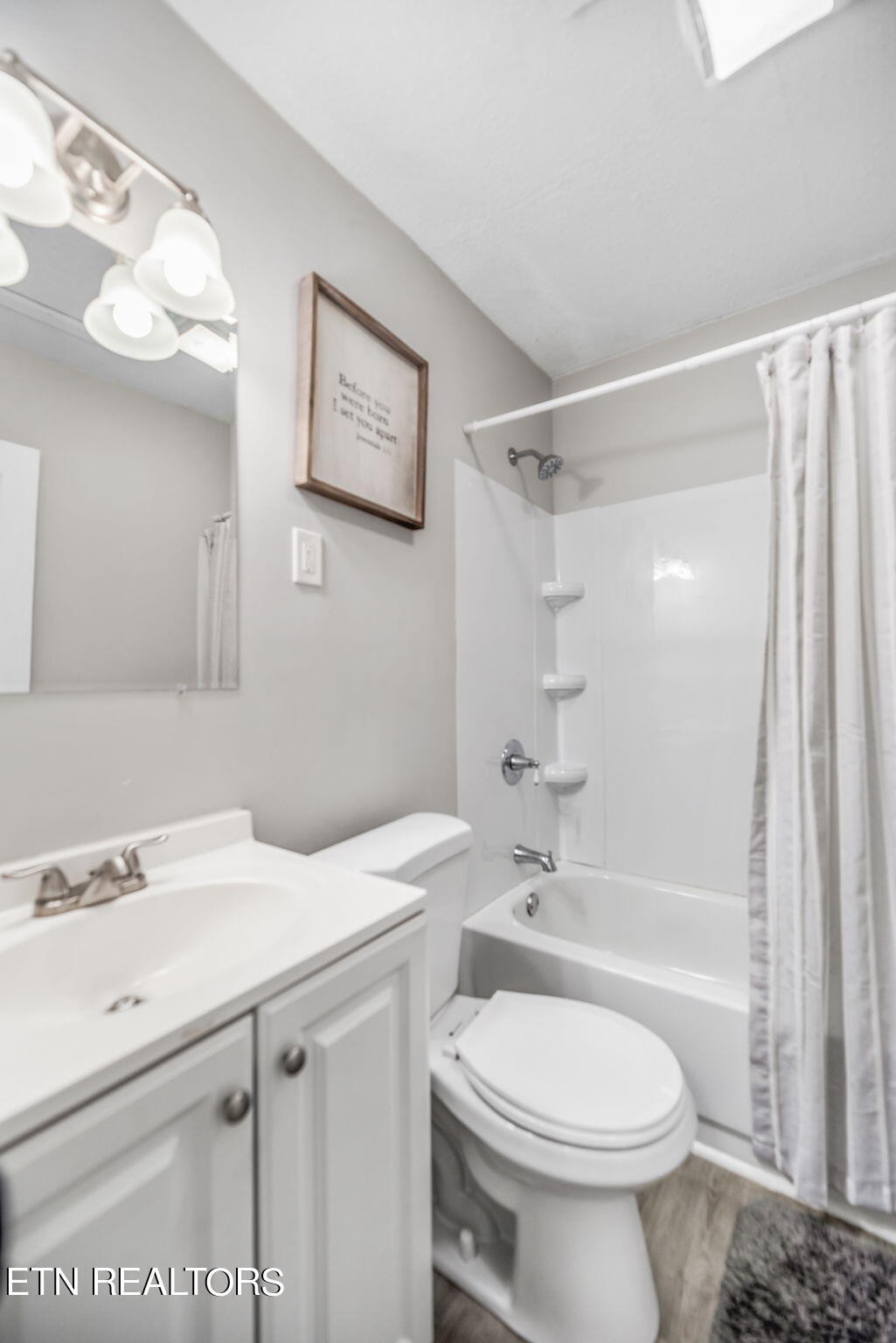 104 Tucker Road Oak Ridge, TN 37830 - Photo 15 of 28 a bathroom with a sink toilet and shower