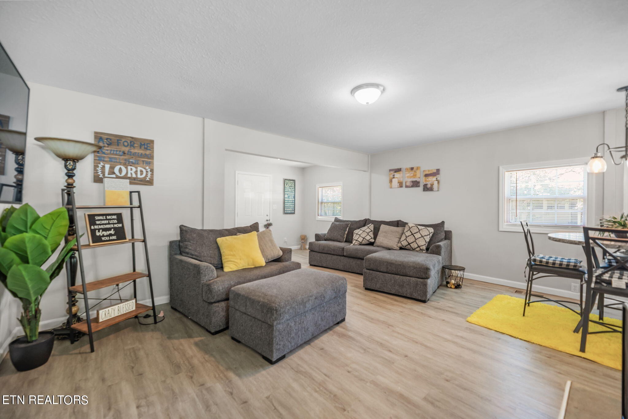 104 Tucker Road Oak Ridge, TN 37830 - Photo 9 of 28 a living room with furniture and a wooden floor