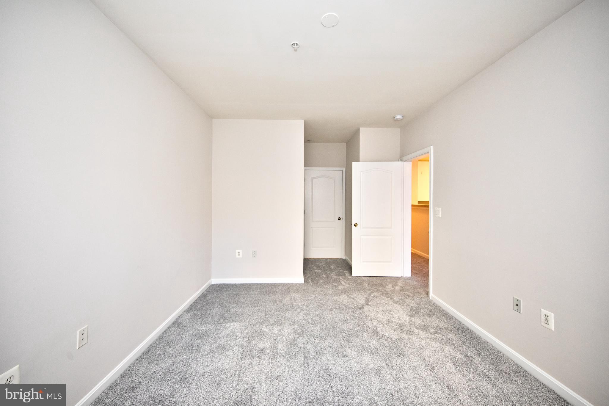 400 Symphony Circle, Unit 74B Cockeysville, MD 21030 - Photo 19 of 36 a view of an empty room