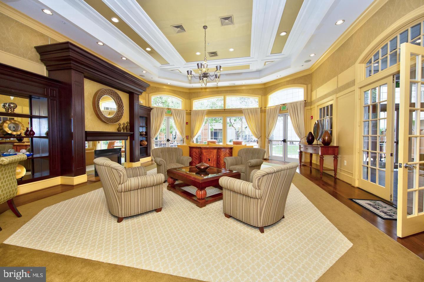 400 Symphony Circle, Unit 74B Cockeysville, MD 21030 - Photo 25 of 36 a living room with furniture and a large window