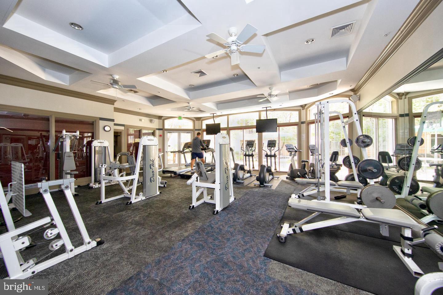 400 Symphony Circle, Unit 74B Cockeysville, MD 21030 - Photo 29 of 36 a view of a room with gym equipment