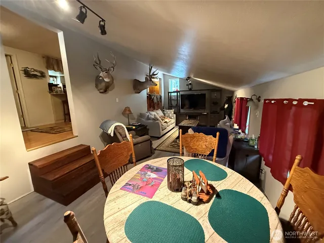 a room with furniture and a window