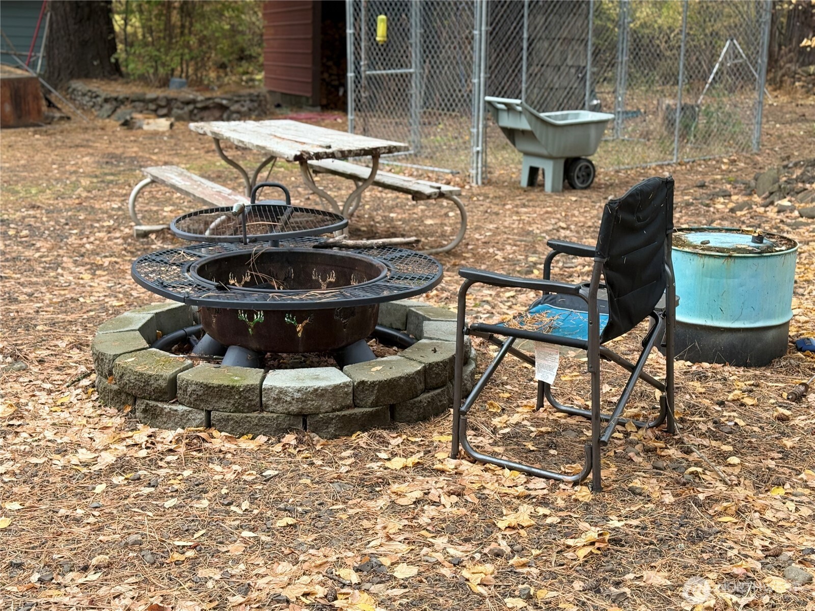 111 Tamarack Lane Dayton, WA 99328 - Photo 26 of 38 a view of a backyard with table and chairs potted plants
