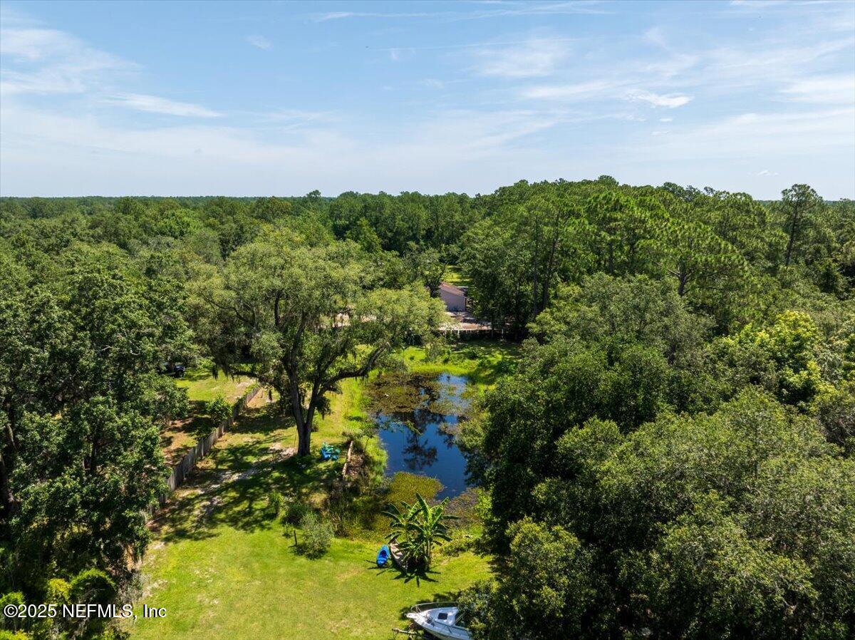 1489 Sheffield Road St. Johns, FL 32259 - Photo 7 of 9 a view of a lake with houses